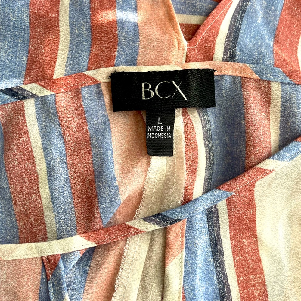 Flutter Sleeve Tie Back Cropped Junior's Top (Multi
Distressed Stripe) - Picture 12 of 13